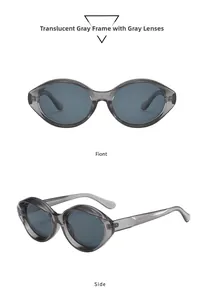 Detail of vintage oval cat eye sunglasses with transparent gray frames and gray lenses