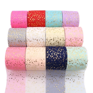 Glitter gold star tulle ribbon rolls in various colors for DIY crafts and hair bows