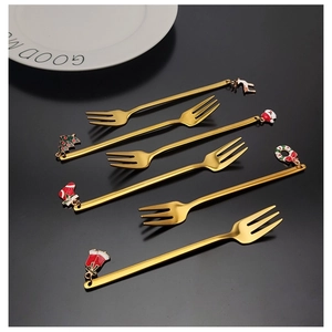Detailed view of 304 gold stainless steel dessert forks with Christmas charms