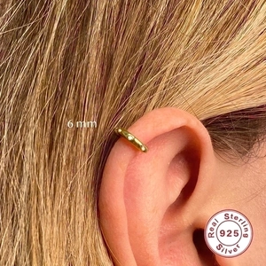 6mm gold S925 sterling silver hoop earring with cubic zirconia on female ear cartilage
