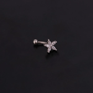 Detail of silver curved barbell with a sparkling five-petal zircon flower and metal ball