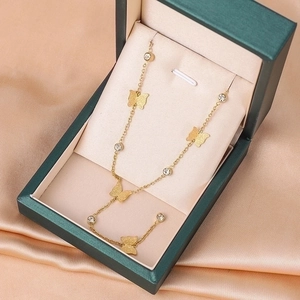 Elegant gold titanium steel butterfly necklace with crystals on premium silk lining