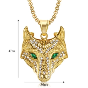 Gold-plated Viking wolf head pendant with white crystals and green gemstone eyes