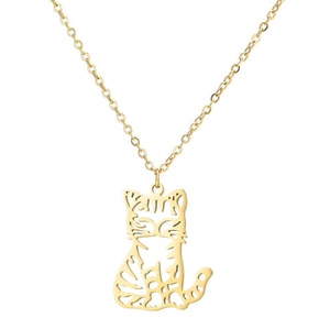 Close-up of golden stainless steel necklace with a hollow cat pendant on white background
