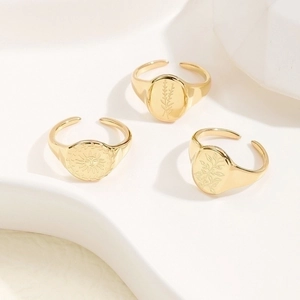 Three-piece set of 18K gold plated stainless steel open rings with sun and floral engravings