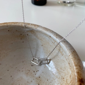 Minimalist 925 sterling silver interlocking rectangle necklace with pave cubic zirconia