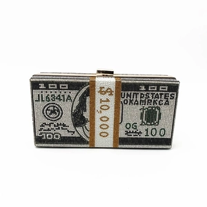 Detail of the sparkling rhinestone dollar bill clutch with metallic closure mechanism