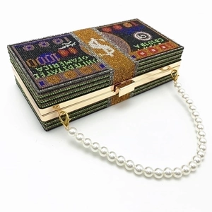 Sparkling dollar stack evening clutch bag with crystal rhinestones and pearl handle