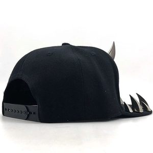Black punk hip hop flat brim baseball cap with metal studs and horns in side view