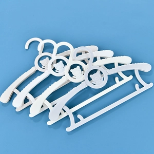 Pack of 5 adjustable plastic baby hangers with non-slip bear design in beige and blue