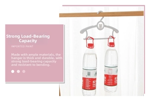 Detail showing the heavy-duty load capacity of white plastic children's clothes hangers