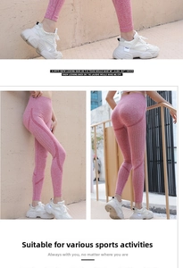 Detail of high-waisted seamless pink yoga leggings with peach butt lifting shape lines