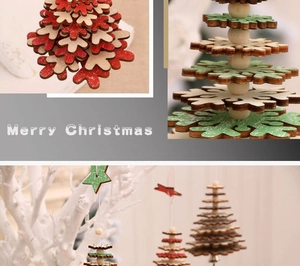 Detail of wooden 3D Christmas tree ornaments in red, white and green festive colors