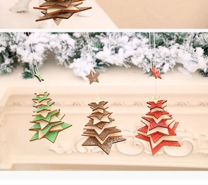 Detailed view of multilayered star-shaped wooden Christmas ornaments in green, brown, and red