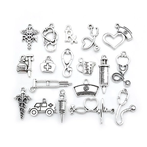 Collection of silver medical charms including stethoscope and nurse hat for DIY jewelry