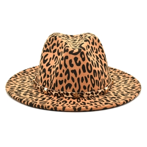 Detail of leopard print fedora with gold star rivets and decorative hat band