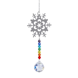 Detail of silver snowflake metal ornament with colorful beads and a faceted crystal ball