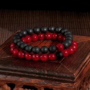 Elastic beaded bracelet set with matte black agate and marbled red lava stone