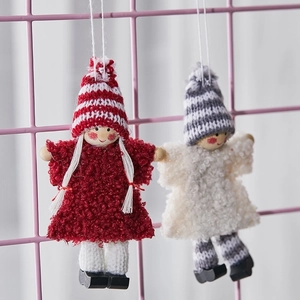 Christmas felt angel doll pendants with red and white plush dresses on pink grid