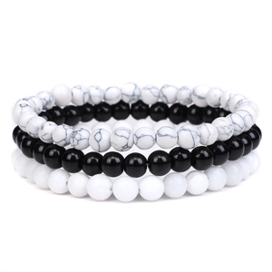 Set of three 8mm natural stone stretch bracelets in marble, black, and white finishes