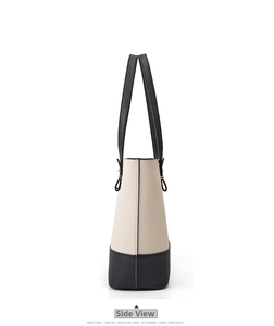 Side view of structured cream and black contrast tote bag in premium crossgrain leather