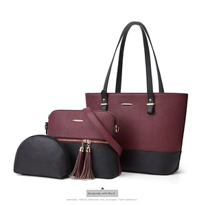 Three-piece tote bag set in burgundy and black leather with cross-grain texture