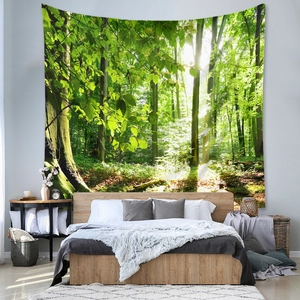 Detail of forest landscape tapestry with sunlight showing decor effect above the bed
