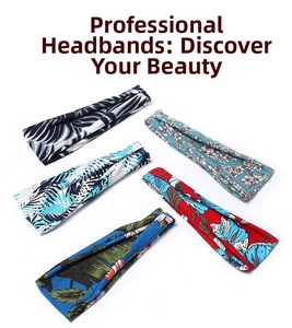 Close-up of five elastic yoga headbands with tropical leaf and floral patterns