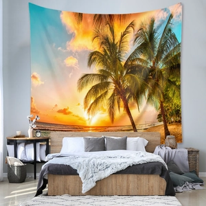 Detail of tropical sunset tapestry with palm trees on bedroom wall hanging background