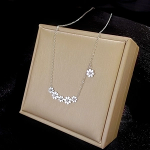 Minimalist silver titanium steel necklace with six delicate flowers for women