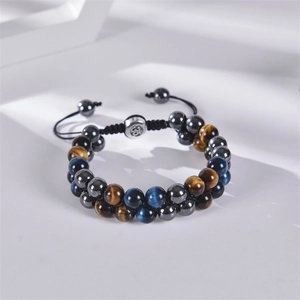 Double layer braided bracelet with blue tiger eye stone, black hematite and Om charm