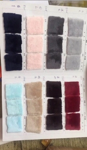 Detailed fabric color chart showing various plush textures and shades for the rabbit blanket