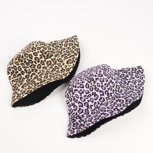 Stylish leopard print bucket hats in classic tan and lilac purple colors for women