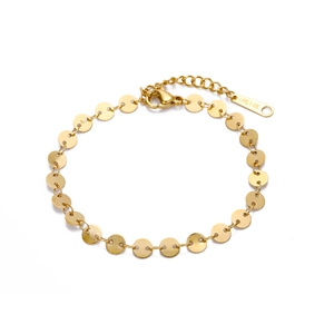 Polished titanium steel bracelet with gold disc links and adjustable lobster clasp closure