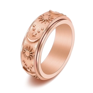 Rotatable titanium steel ring with sun moon and star motifs in rose gold finish