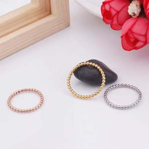 Minimalist gold-plated stainless steel bead rings in rose gold, gold, and silver finishes