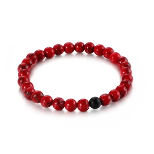 Retro beaded elastic bracelet with red veined stones and a matte black bead accent