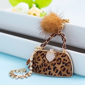 Leopard print handbag keychain with mink fur pompom and rhinestone heart charm