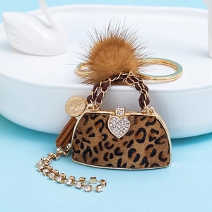 Luxurious Leopard Print Mini Bag Keychain With Plush Pompom Tassel Alloy Rhinestone Heart Charm Bag Pendant For Women