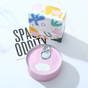 Detail of artistic paper box and pink geometric tin candle with 80g weight spec
