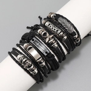 6-piece black woven leather bracelet set featuring feather, star, cross, and skull charms