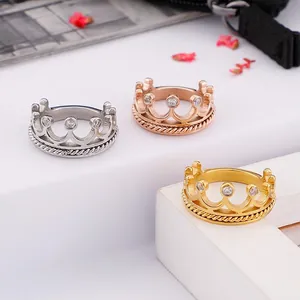 Elegant crown rings set in gold, silver and rose gold with sparkling zircon stones