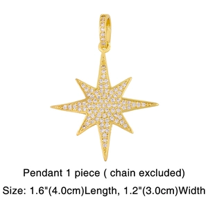 Détail d'un pendentif étoile à huit branches doré serti de zircons cubiques blancs