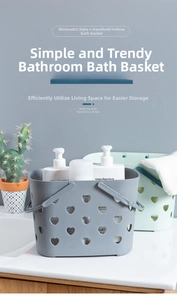 Detail of grey and green plastic shower baskets with heart cutouts in a bathroom setting