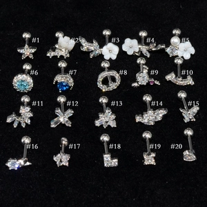 Set of 20 assorted stainless steel stud earrings with blue zircon and flower motifs