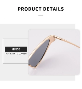 Close-up of durable metal hinge on futuristic triangle sunglasses with gold frames