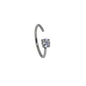 Minimalist silver stainless steel nose ring with a round zircon in a four-claw setting