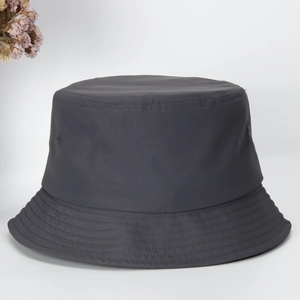 Detailed view of quick-drying grey bucket hat with high-quality water-resistant fabric