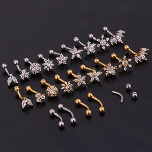 Collection of zircon curved eyebrow rings and ear cartilage studs in gold and silver finish