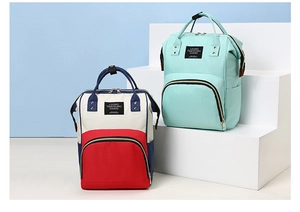 Front view of large capacity waterproof diaper bags in tricolor and mint green colors